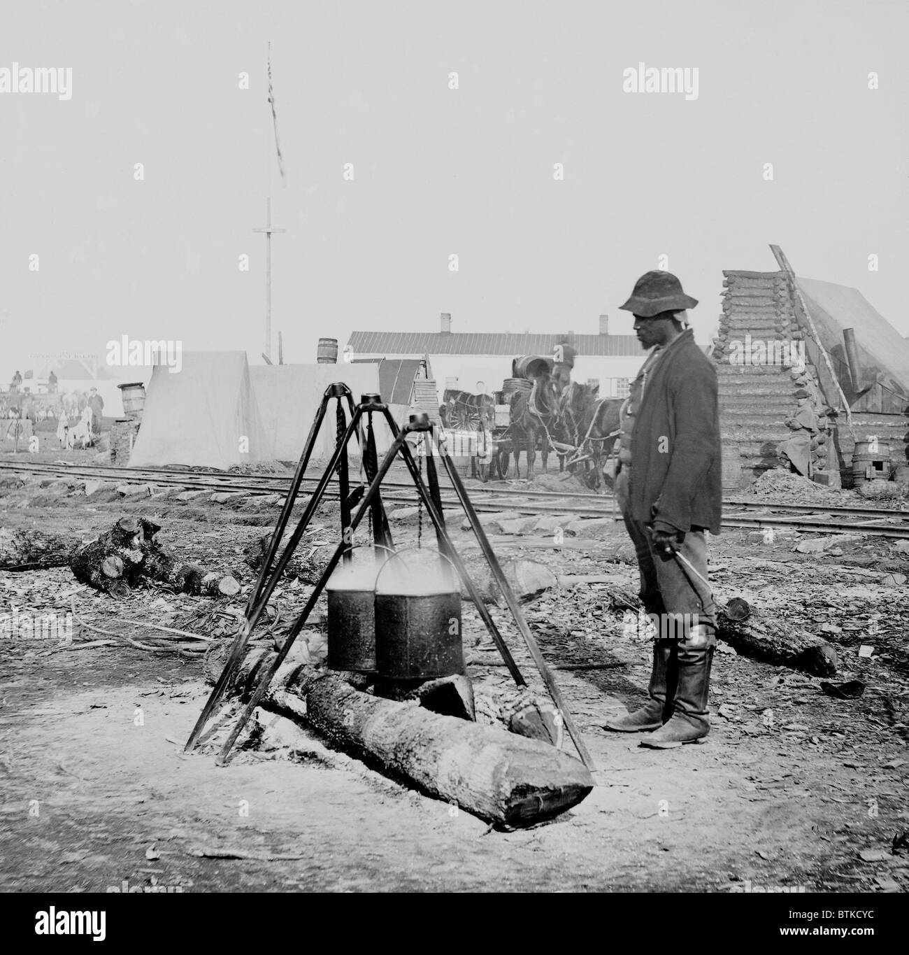 African American Union army cook at work at City Point, Virginia during the Richmond-Petersburg Campaign, fought from June 1864, to March 1865. The campaign used the largest concentration of African American troops of the Civil War. Stock Photo
