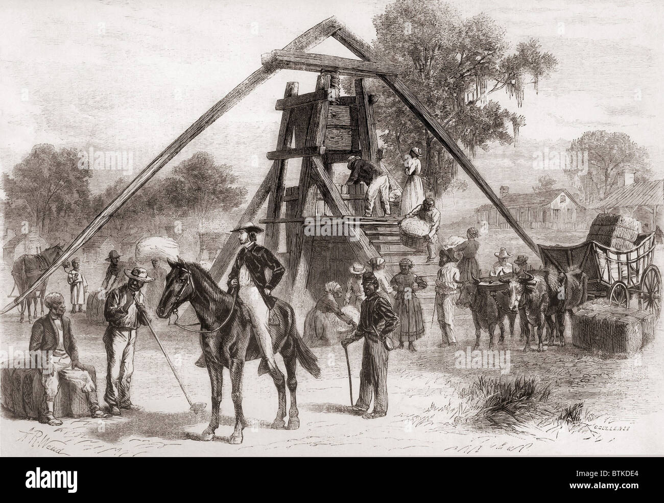 Cotton press in operation in the South after the U.S. Civil War. The