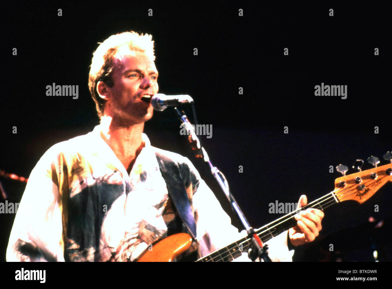 Sting performing with the Police at the concert for  Amnesty International, Giant Stadium, New Jersey, June 15, 1986, Stock Photo