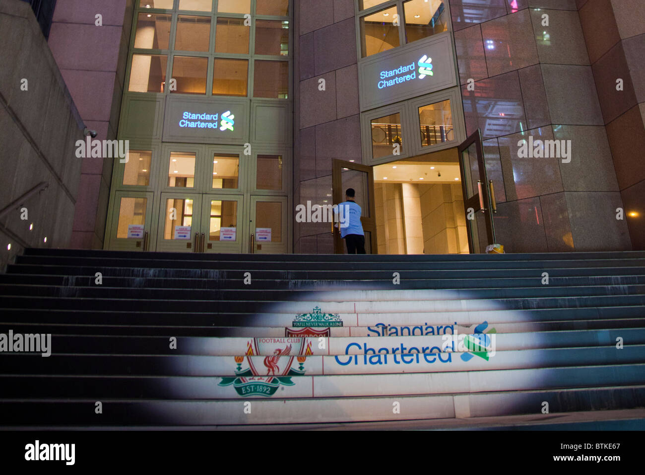 The Standard Chartered Bank Building In Honk Kong Sponsors Of Liverpool Football Club Uk Stock Photo Alamy