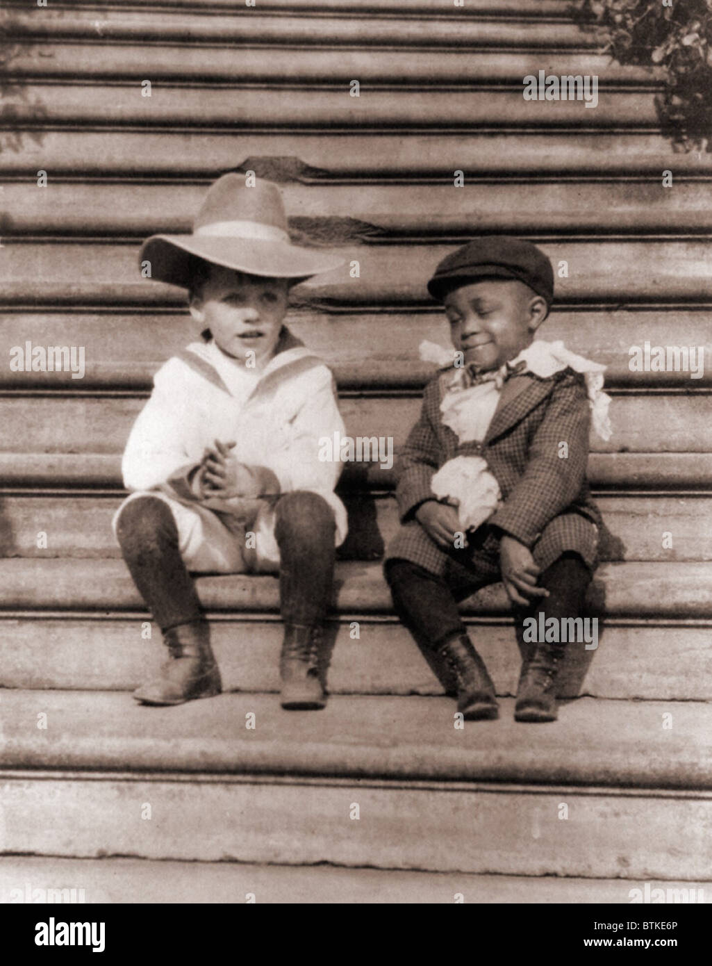Quentin Roosevelt (1897-1918), with his African American friend, Roswell Newcomb Pinckney, son of White House steward, Henry Pinckney. Photo by Frances Benjamin Johnson, 1902. Stock Photo