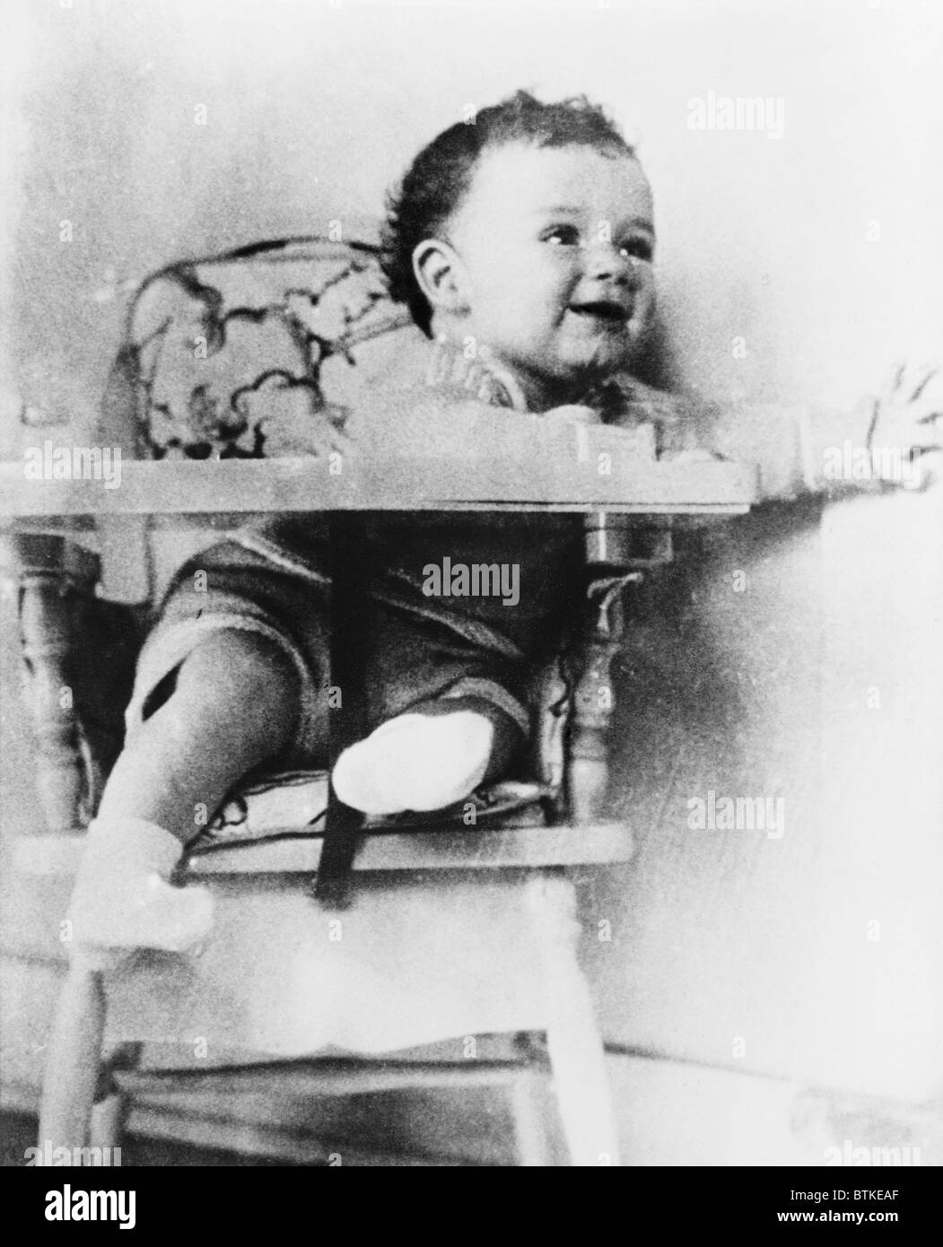 Charles A. Lindbergh Jr., son of the celebrated aviator, in highchair. Stock Photo