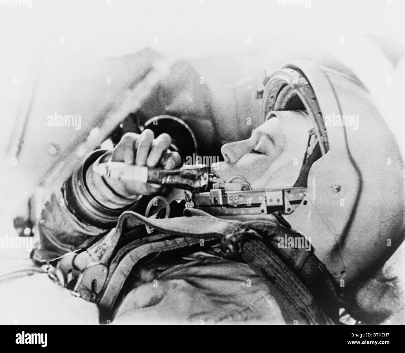 Valentina Vladimirovna (b.1937) Russian cosmonaut and the first woman in space eating from a food tube during training. Stock Photo