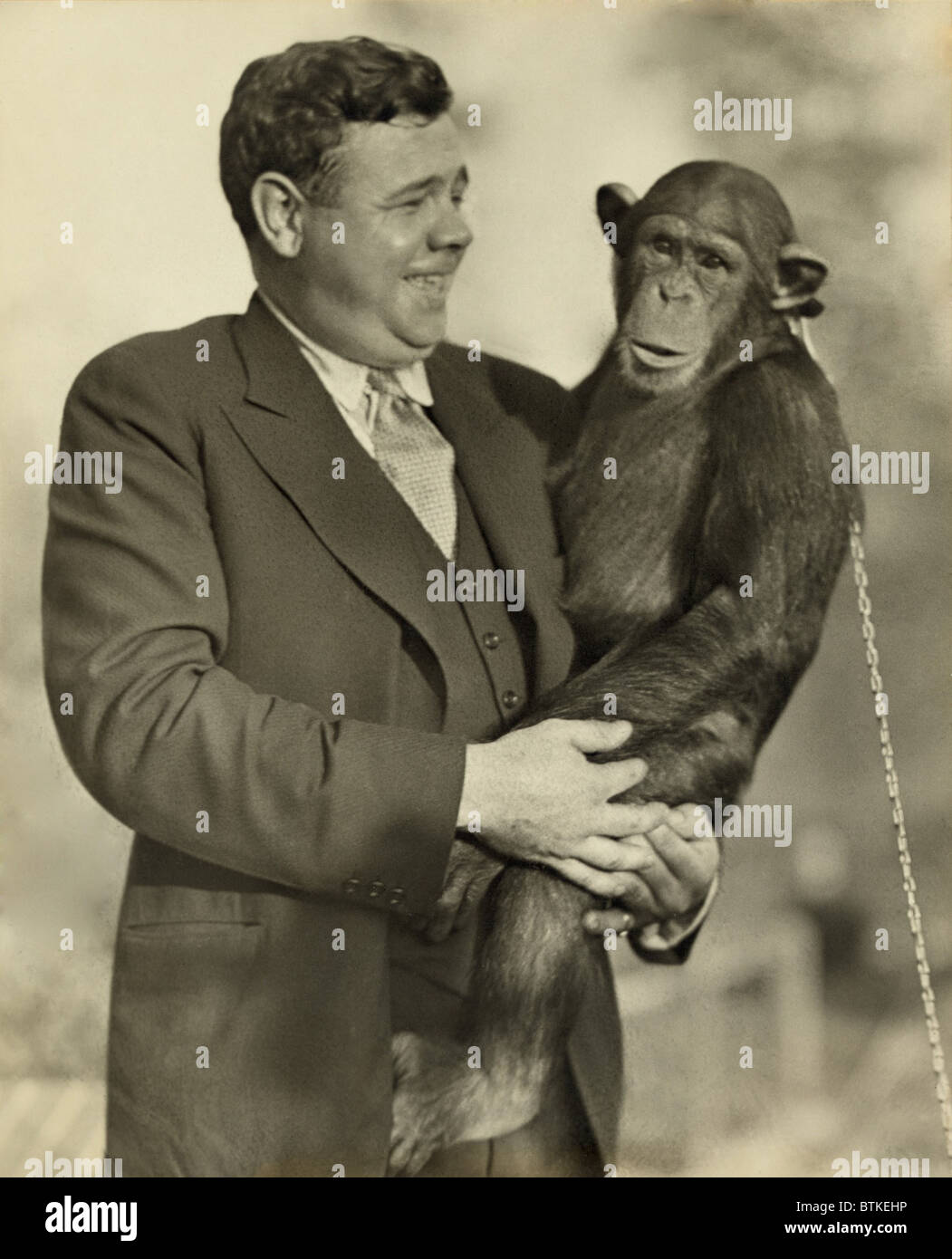 Babe Ruth (1895-1948), holding Mike, a chimpanzee at the St. Louis ...