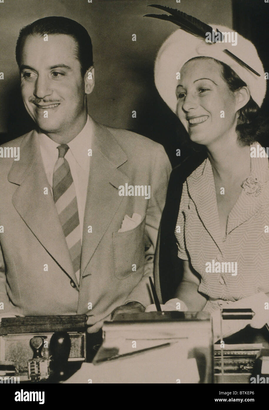 Hollywood producer, Mike Frankovich (1910-1992) and bride to be, English actress Binnie Barnes (1903-1996) in 1940. Both had long film careers extending into the 1960s. Stock Photo