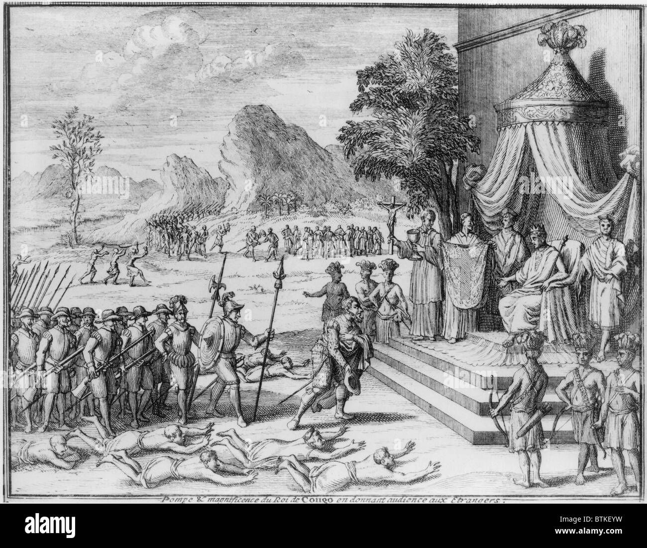 The King of the Congo receives Portuguese soldiers as three Christian missionaries stand beside the King. In the previous century, the King Nzinga Nvemba (1506-1543) converted to Christianity and became allied with Portugal. The slave trade grew to dominate all other commerce, eventually destroying the social and political structure of the Kingdom. Ca. 1650. Stock Photo