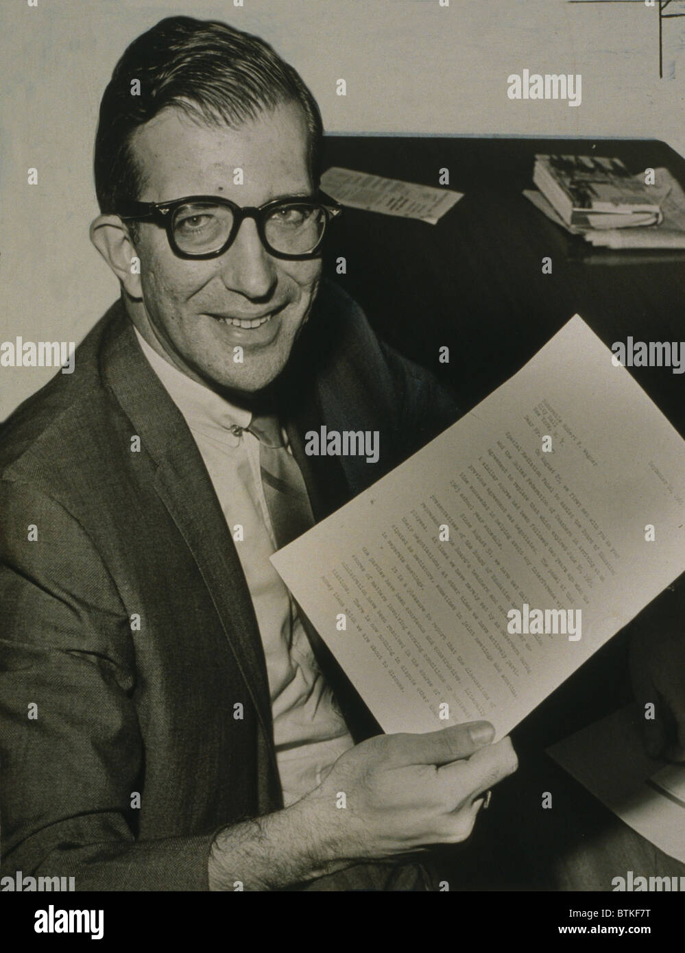 Albert Shanker (1928-1997), leader of the New York City teachers union, threatened to strike during contract negotiations, holding a report issued by mediators in 1965. His militancy was the basis of a joke in Woody Allen's 1973 movie, SLEEPER. Shanker, holds report issued by mediators in 1965. Stock Photo