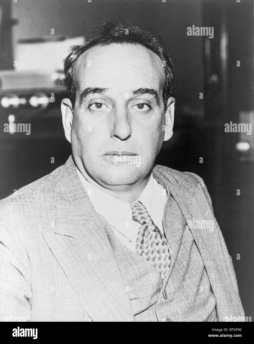 Robert Moses (1888-1981), city planner of New York City from 1933-1959, pursued large scale transformation of the urban landscape and infrastructure during the Great Depression. He built freeways, replaced brownstones with high rise housing projects, enlarged parks, and constructed bridges and tunnels. 1934 portrait. Stock Photo