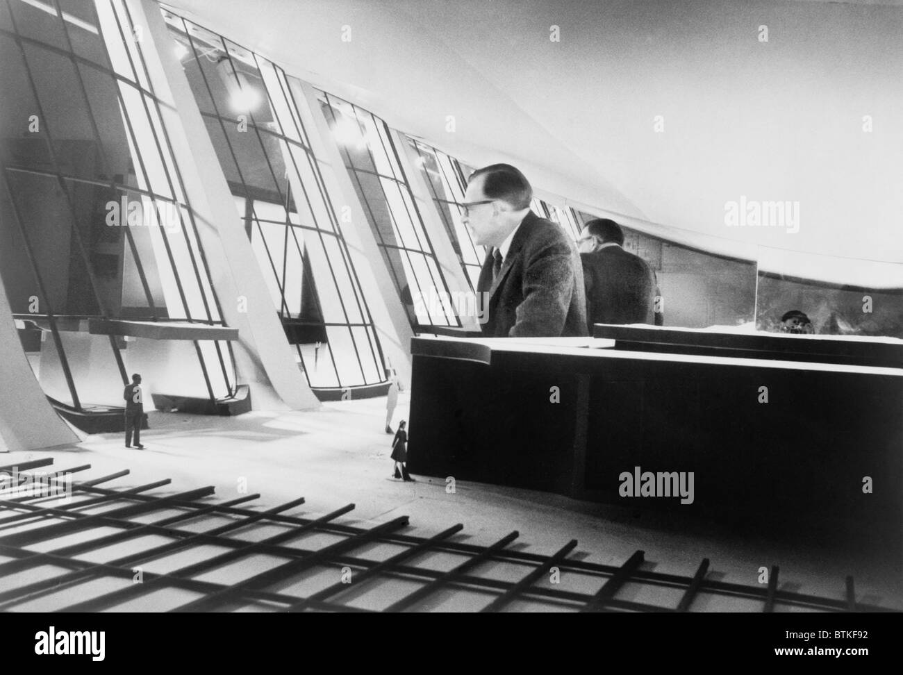 Eero Saarinen (19101961), Finish architect, standing inside model of