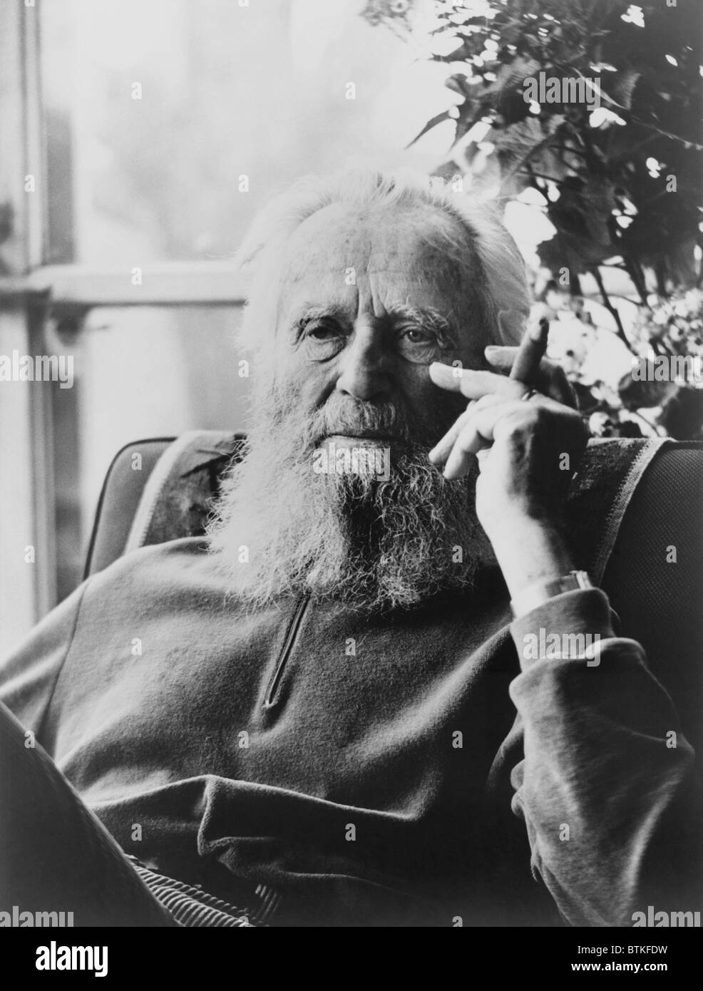 Edward Steichen (1879-1973), the famous photographer at 86, smoking a cigar in 1965. Three years earlier, he published his autobiography, A LIFE IN PHOTOGRAPHY. Stock Photo