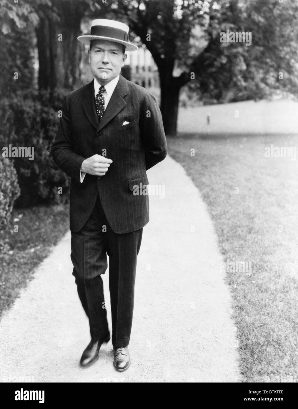 John Davison Rockefeller, full-length portrait, standing, facing right]