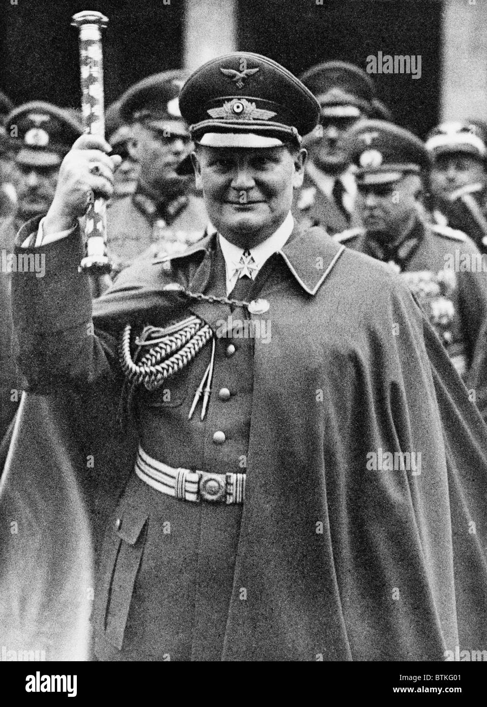 Hermann Goering (1893-1946), holding up his Fieldmarshall's baton at ...