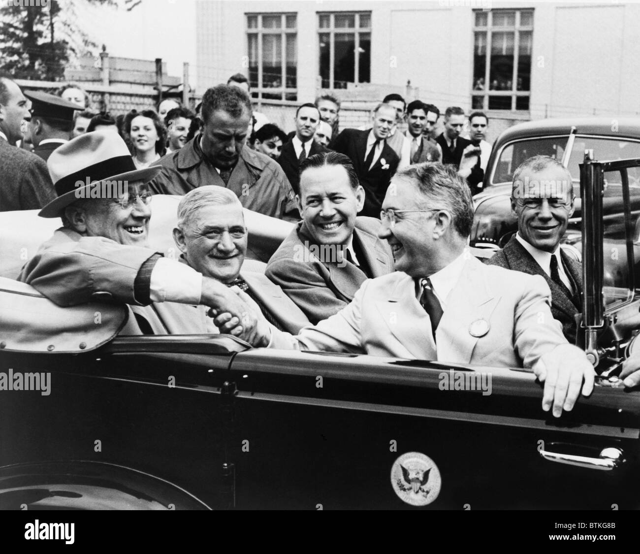 President Franklin Roosevelt with executives who converted their automotive and aviation industries to war production, creating Stock Photo