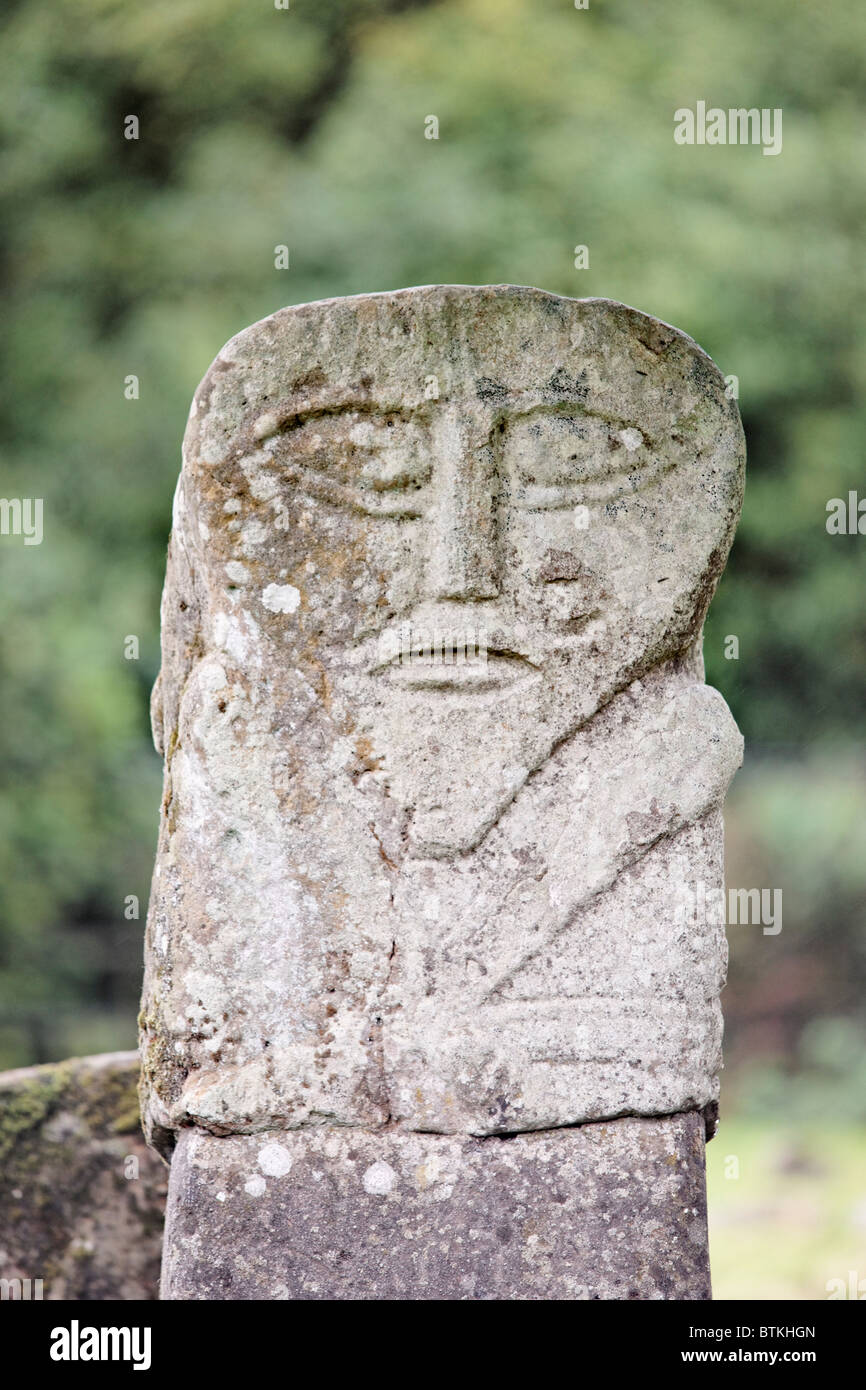 A Janus stone in Calgragh Cemetery, Boa Island, County Fermanagah, Ulster, Northern Ireland, UK. View of the west female side. Stock Photo