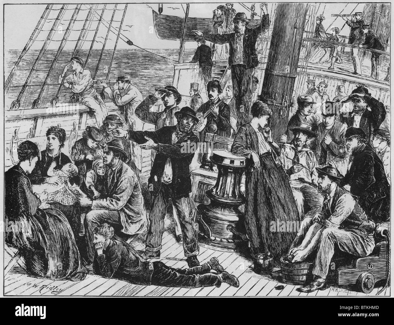 Emigrants on the open deck of an immigrant steamship to Canada, site land after at least two weeks at sea. The ship, GANGES, carried 761 people who paid 3 British pounds for their passage. People on deck engage in play, music, talk, smoking and looking through telescopes. April-May, 1871. Stock Photo
