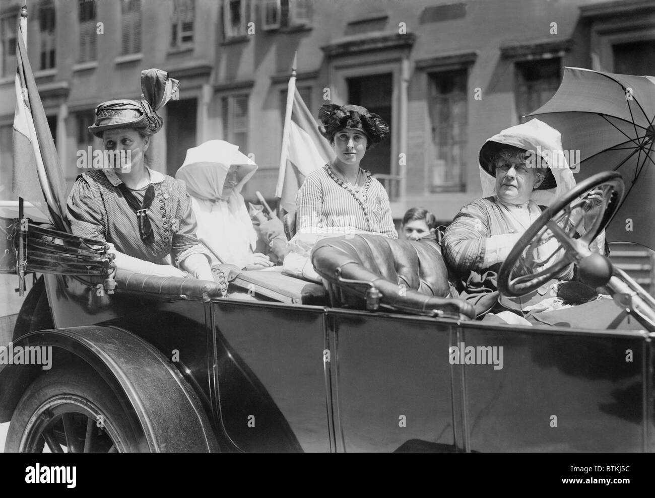 Women's suffrage leaders in an open car at a Votes for Women parade in New York City. Photo shows Susan Walker Fitzgerald, Emma Stock Photo