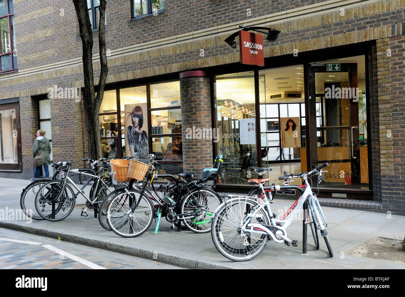 Vidal Sassoon hairdressing salon in Covent Garden with bike parking in front, London England Britain UK Stock Photo