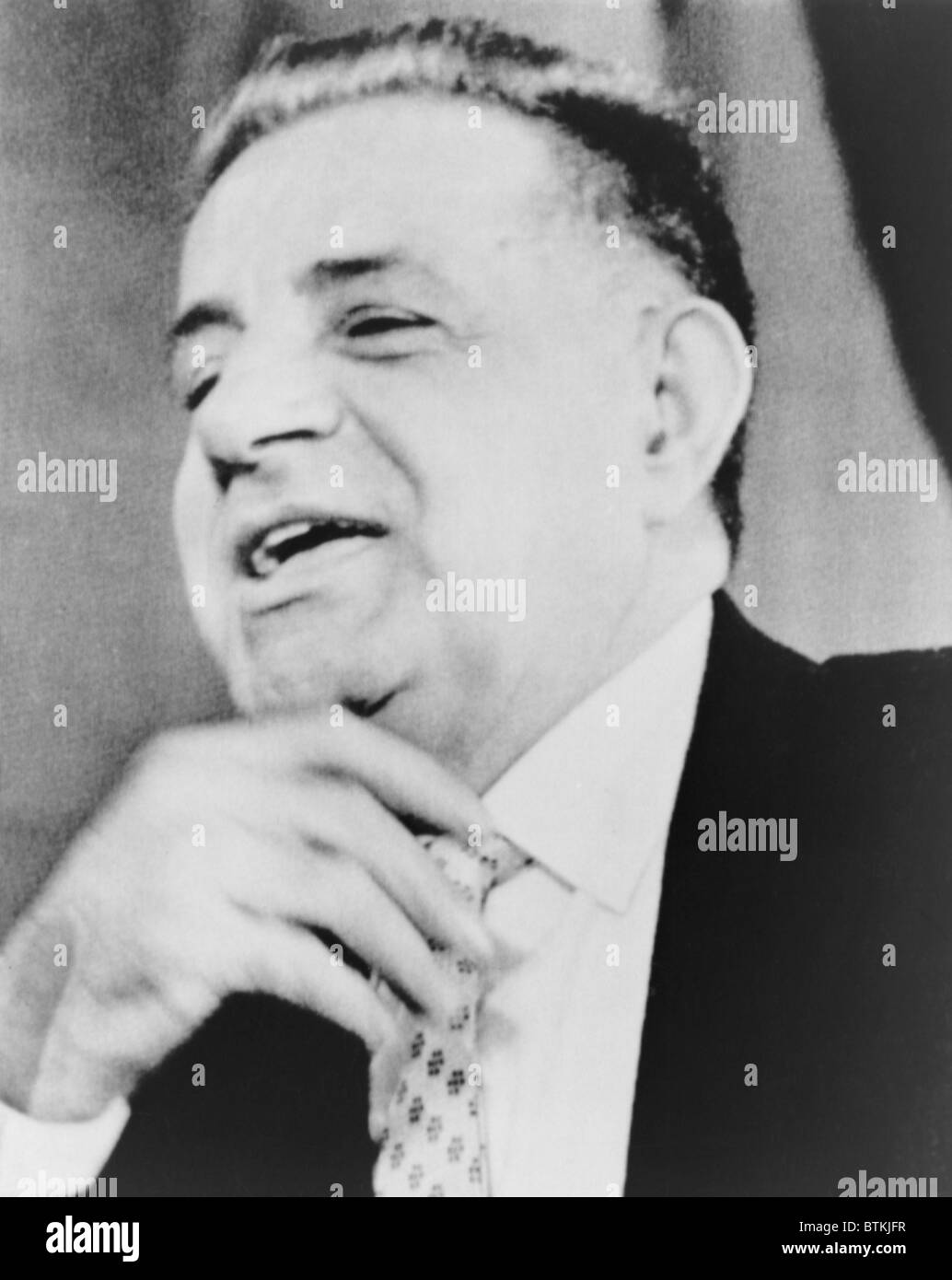 Joseph Valachi, 'singing' during appearance before Senate Investigations subcommittee in 1963. Valachi, a lifelong Mafia insider, provided detailed testimony on Mafia organization, culture, and leaders. Charles Bronson portrayed the gangster in the 1972 movie, THE VALACHI PAPERS. Stock Photo