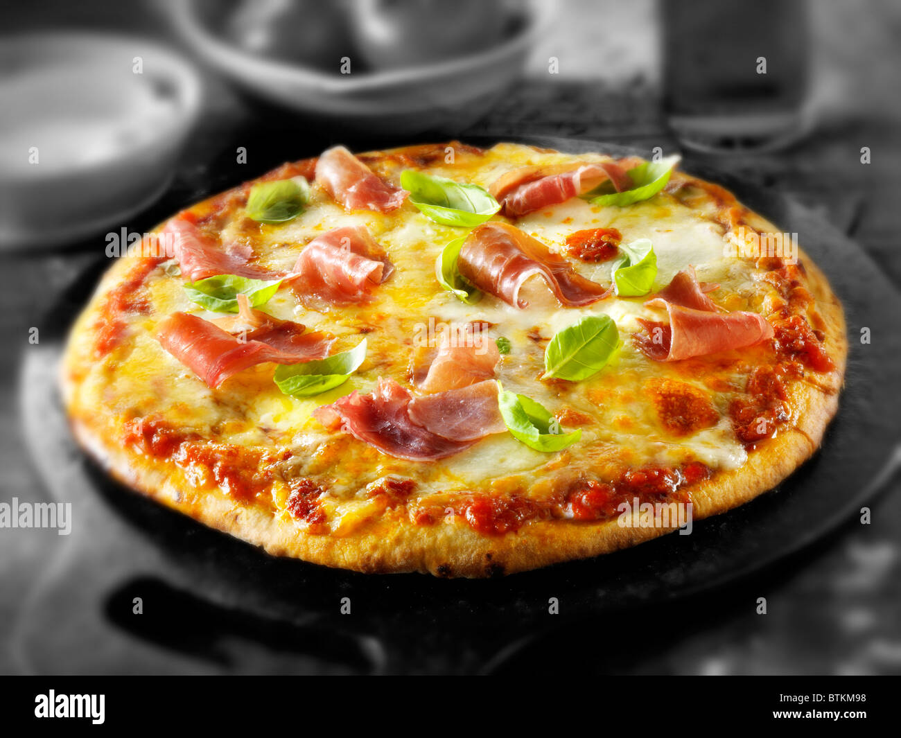 Whole prosciutto pizza Stock Photo