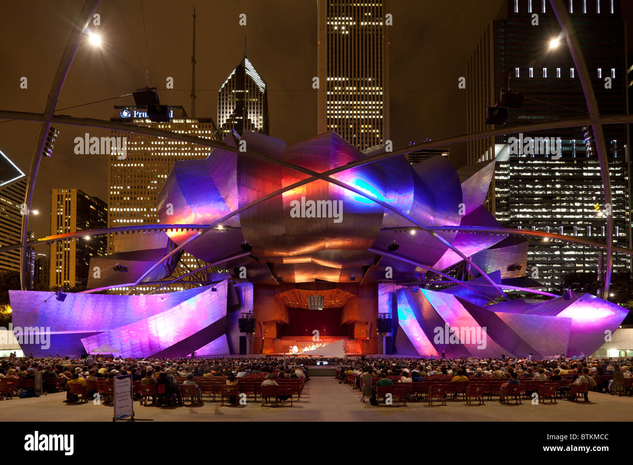 audience and skyline at music concert, Pritzker Pavilion and Great Lawn