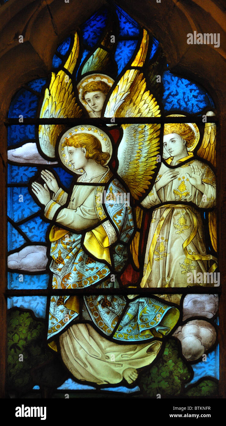 Three angels in stained glass church window Stock Photo Alamy
