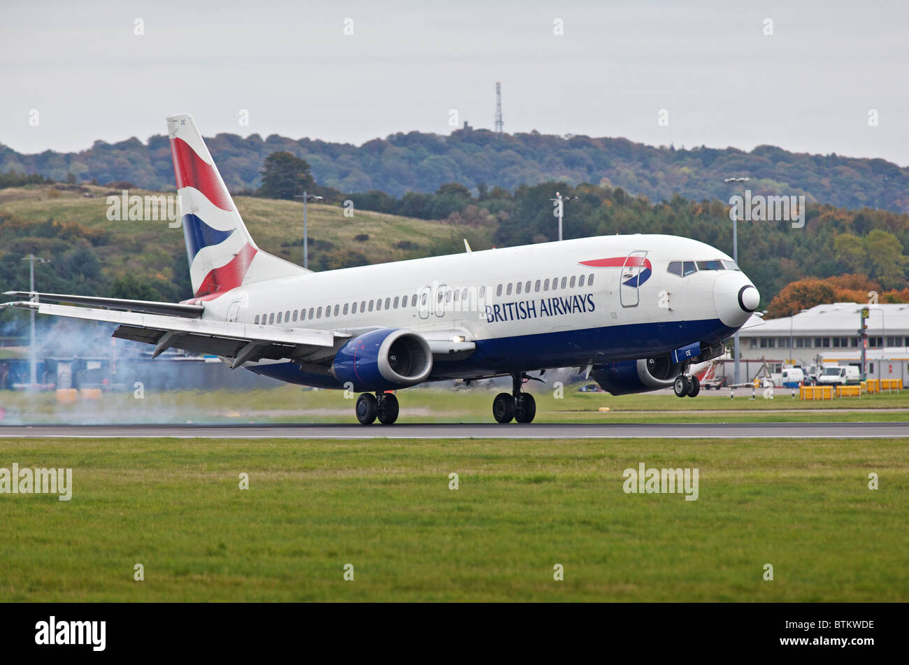 A British Airways (BA) plane landing at Edinburgh aiport, Scotland, UK Stock Photo