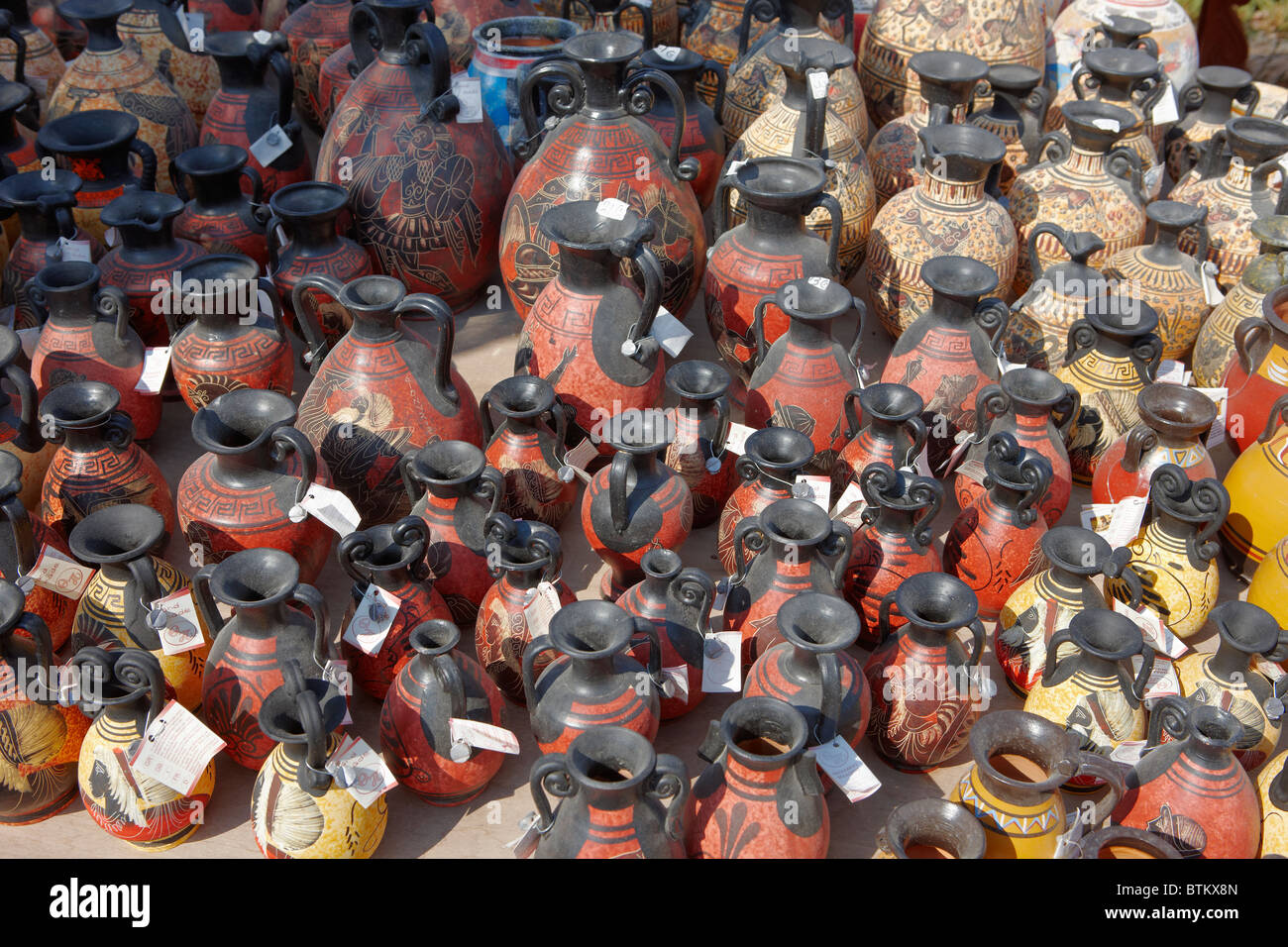 Replicas of ancient Greek amphorae displayed on pottery market. Crete, Greece. Stock Photo