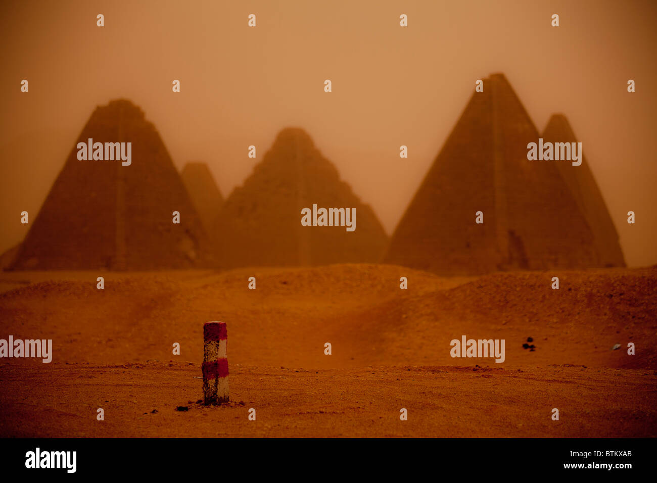 Nubian pyramids in Meroe, Sudan during a sandstorm Stock Photo