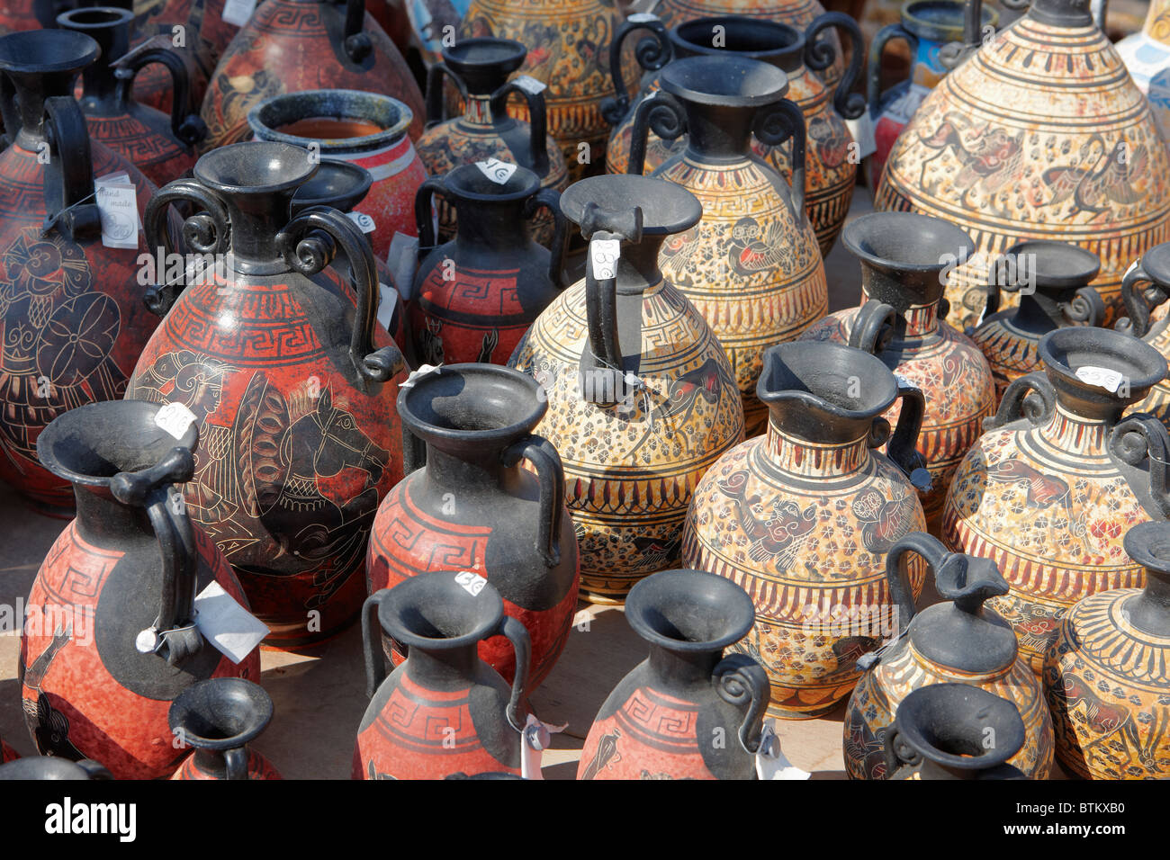 Replicas of ancient Greek amphorae displayed on pottery market. Crete, Greece. Stock Photo