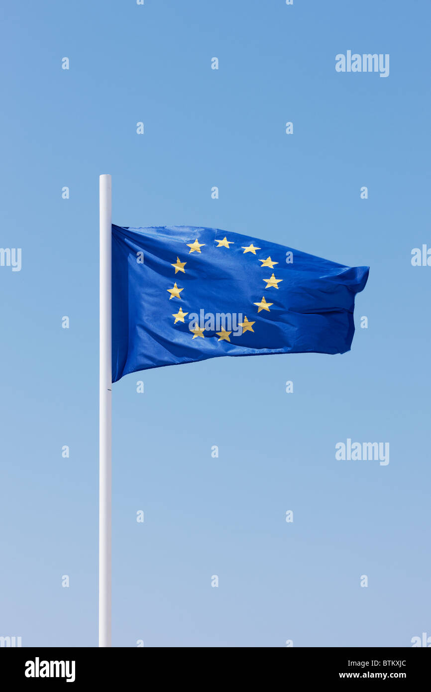 EU flag upon blue sky. Stock Photo