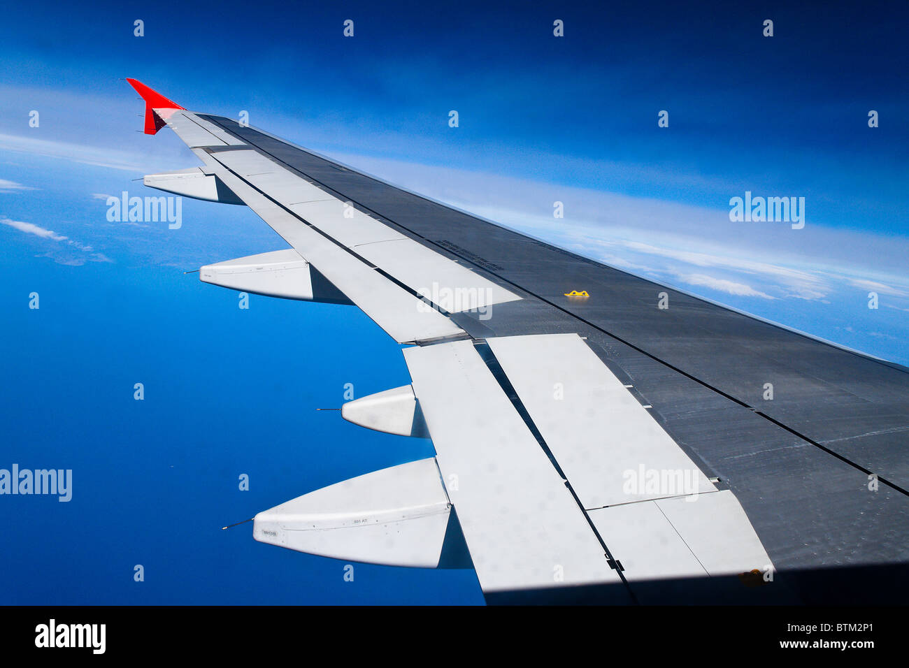 A wing of a passenger plane Stock Photo Alamy