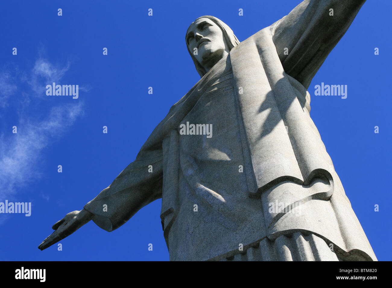 Christ the Redeemer, O Cristo Redentor, is a statue of Jesus Christ in Rio de Janeiro, Brazil Stock Photo