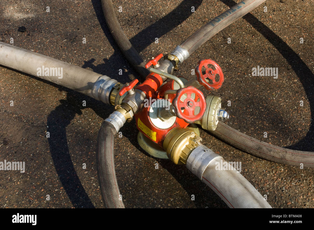 Water hoses at the fire Stock Photo: 32409000 - Alamy