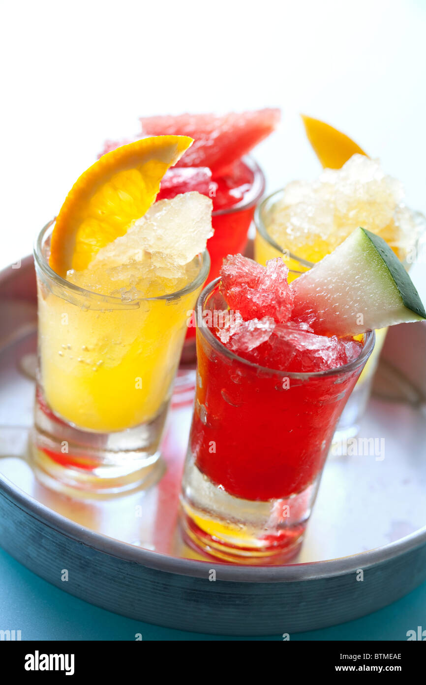 colourful icy fruit drinks on a tray Stock Photo