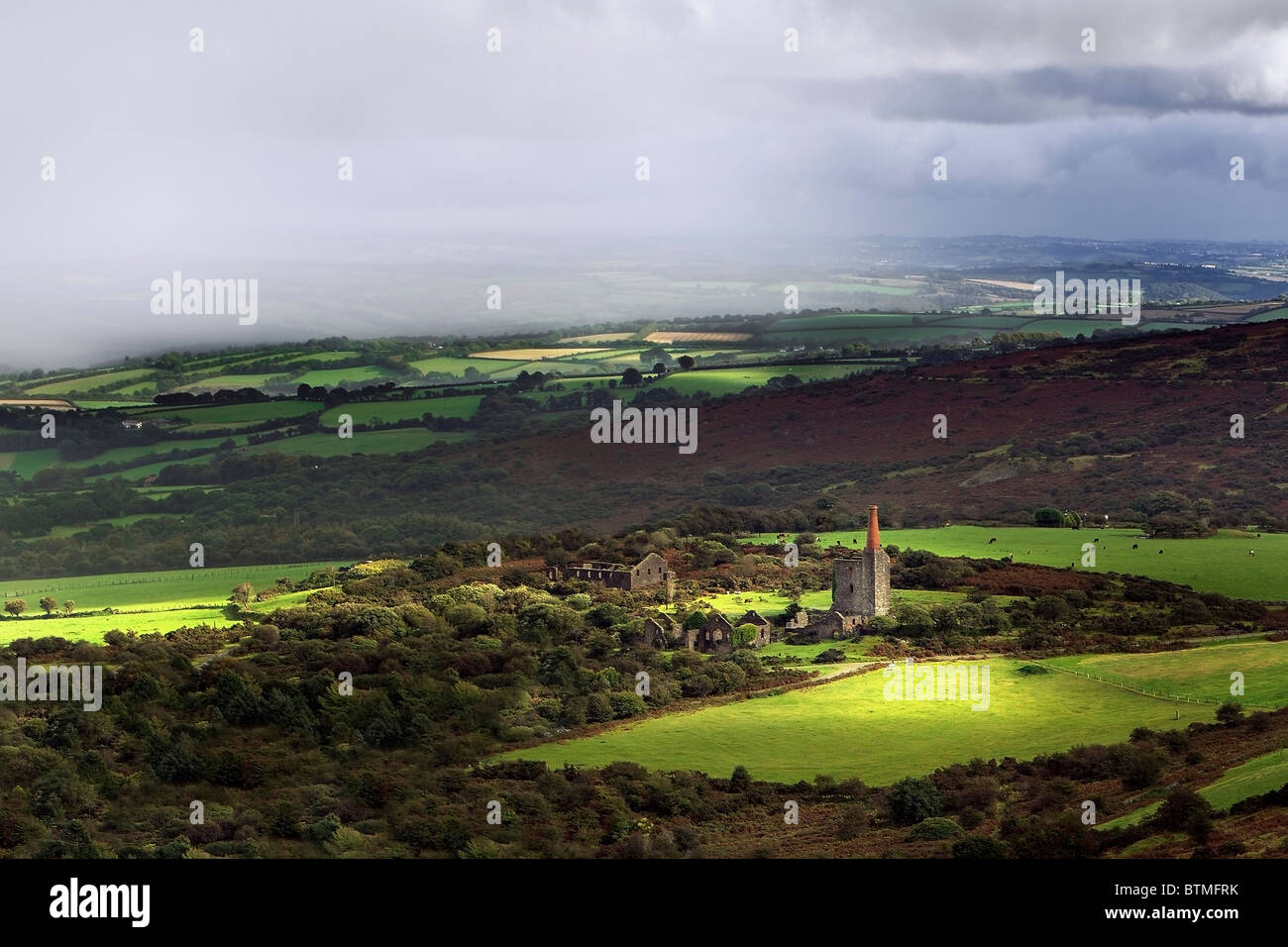 Summer showers over an abondoned tin mine on the edges of Bodmin Moor, Cornwall Stock Photo