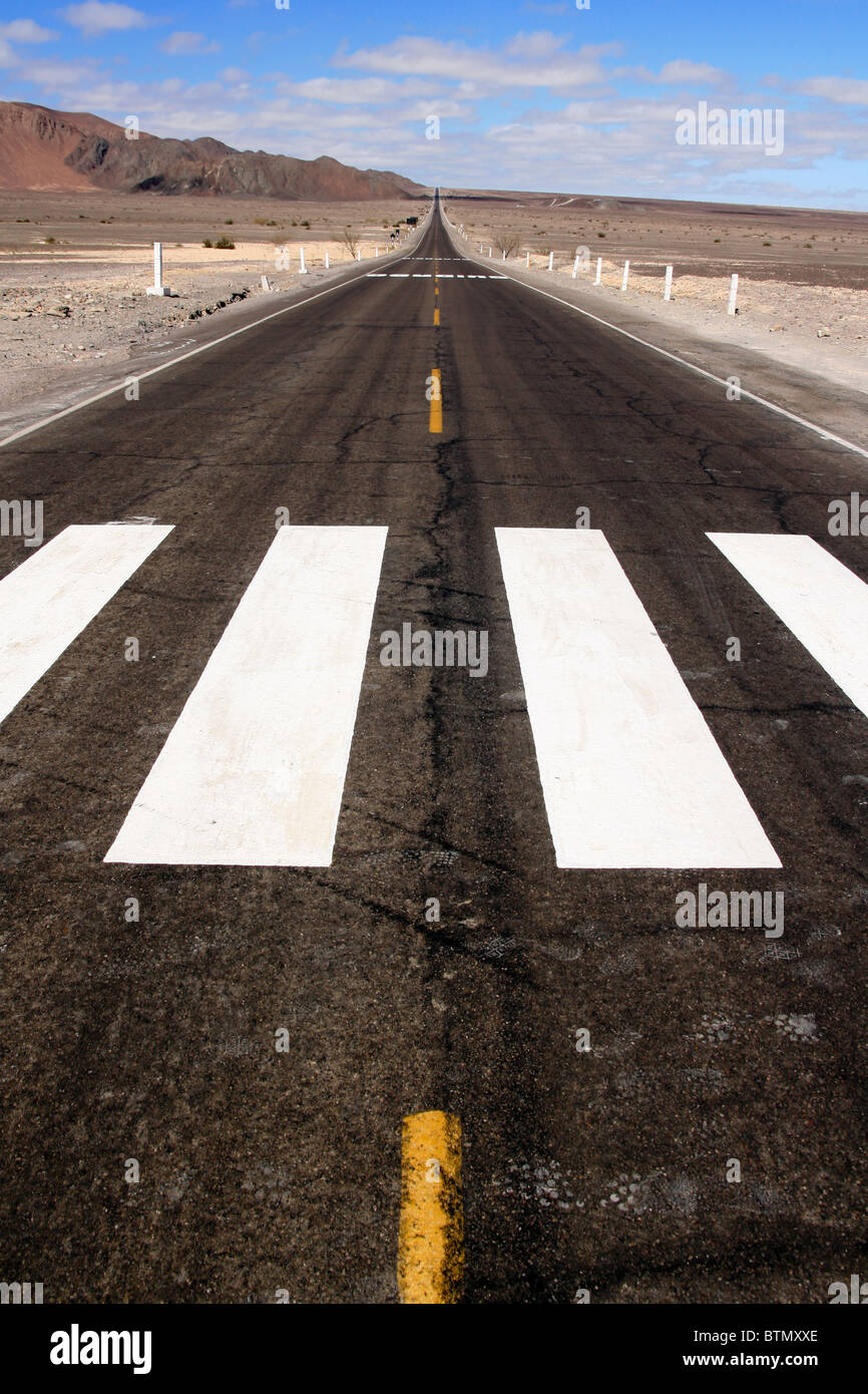 Endless straight desert road in the nasca desert. peru Stock Photo
