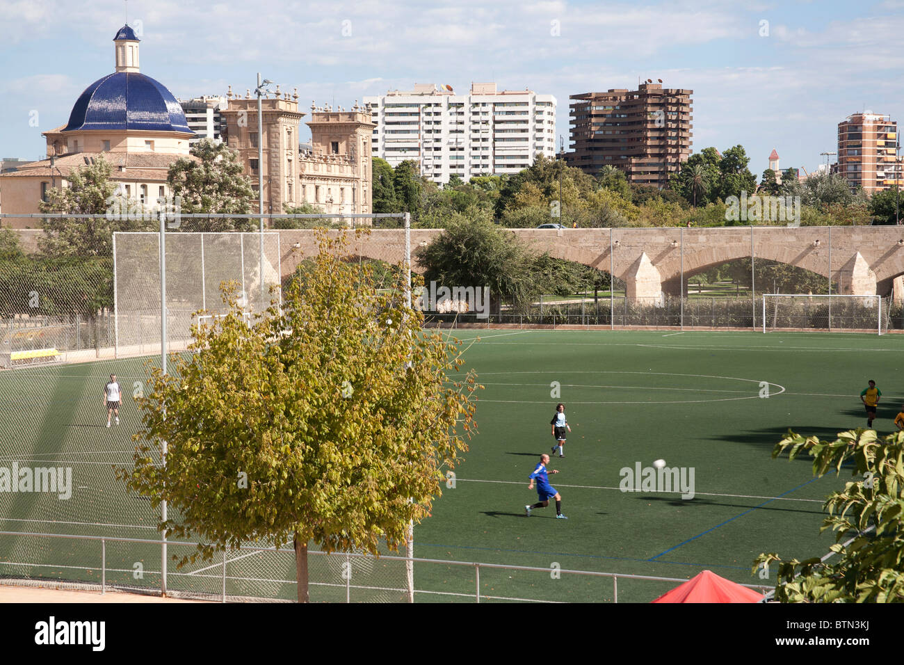 Football pitch in the dried up river bed of the Jardines de Turia  Valencia Spain Stock Photo