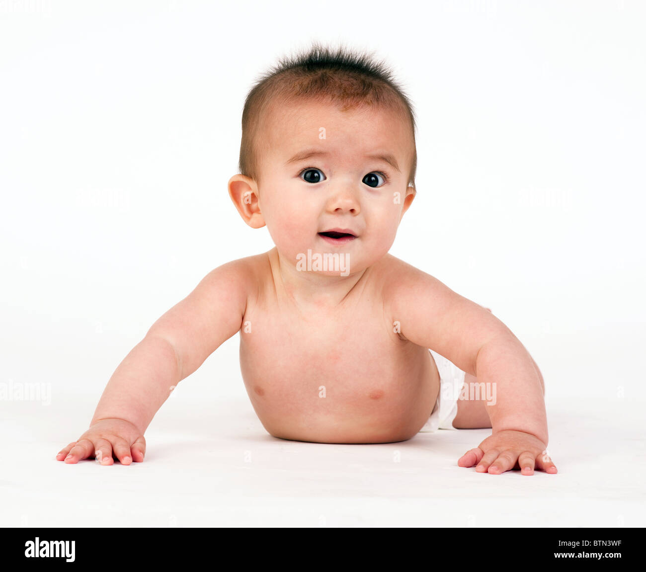 Happy one-year-old European boy poses in a knitted sweater Stock Photo -  Alamy