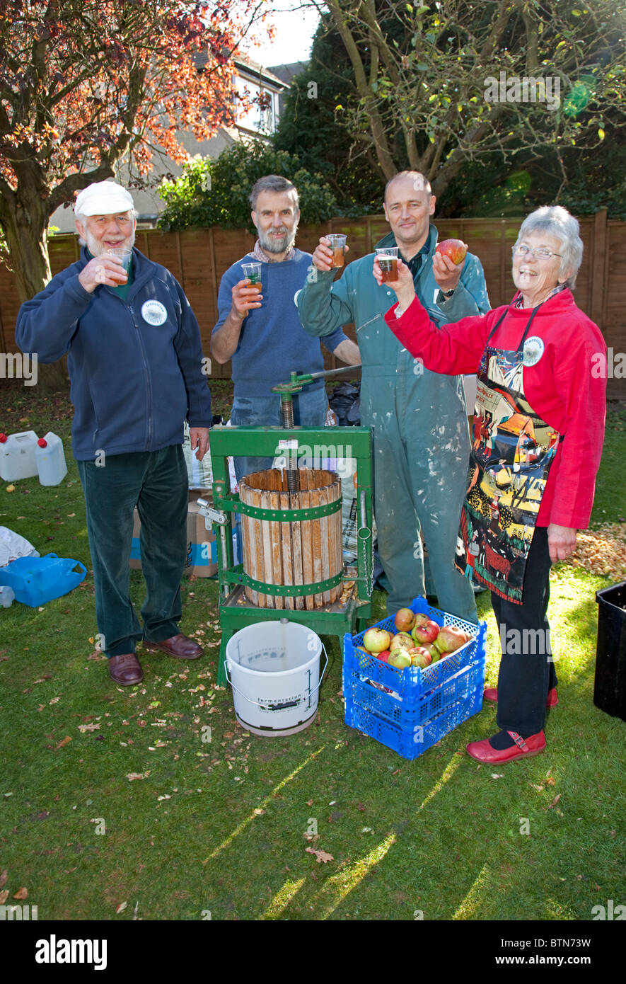 Transition Cleeve members making apple juice Tithe Barn Cleeve UK October 2010 Stock