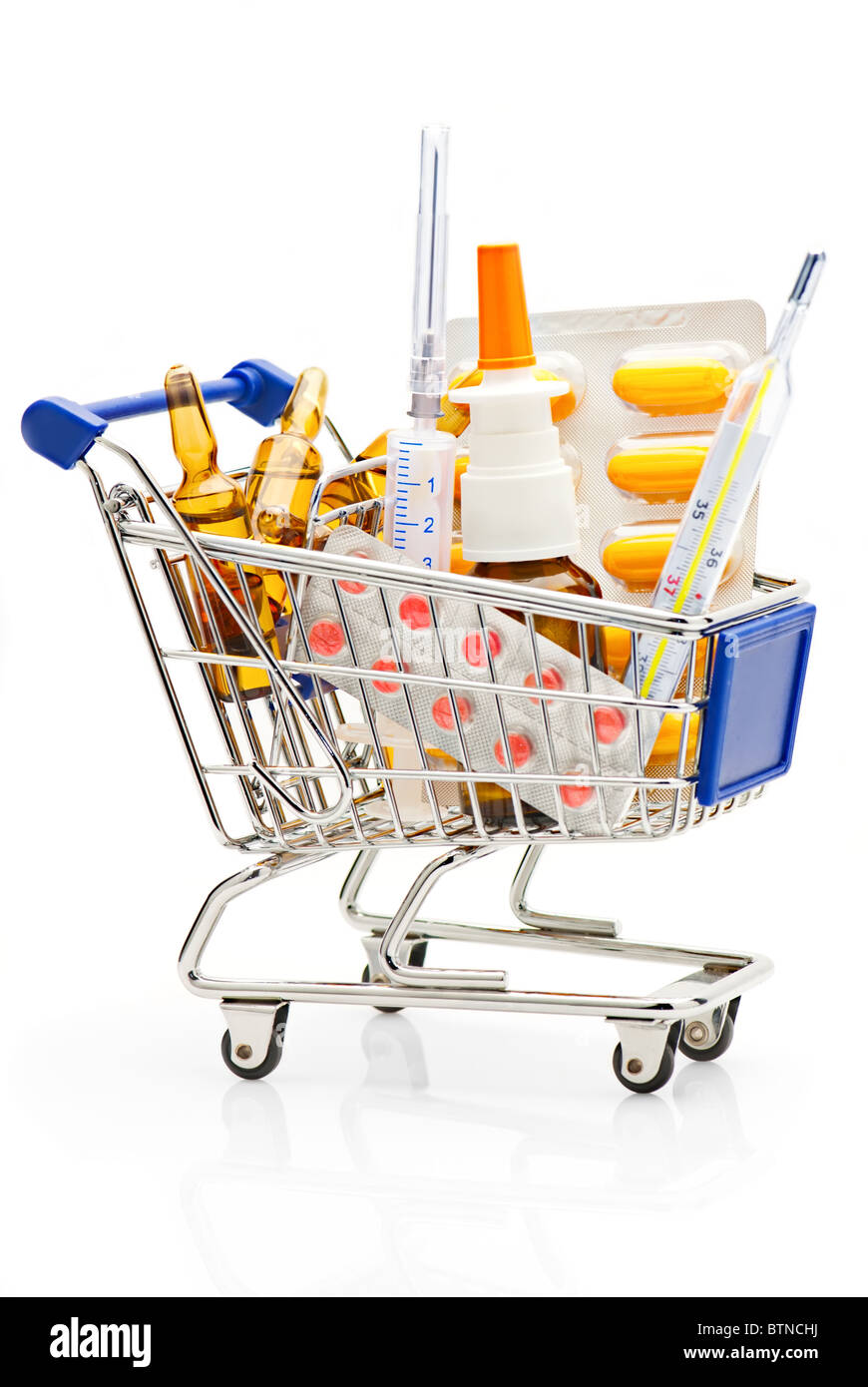 Pharmacy. Shopping Cart full with different medical supplies Stock Photo