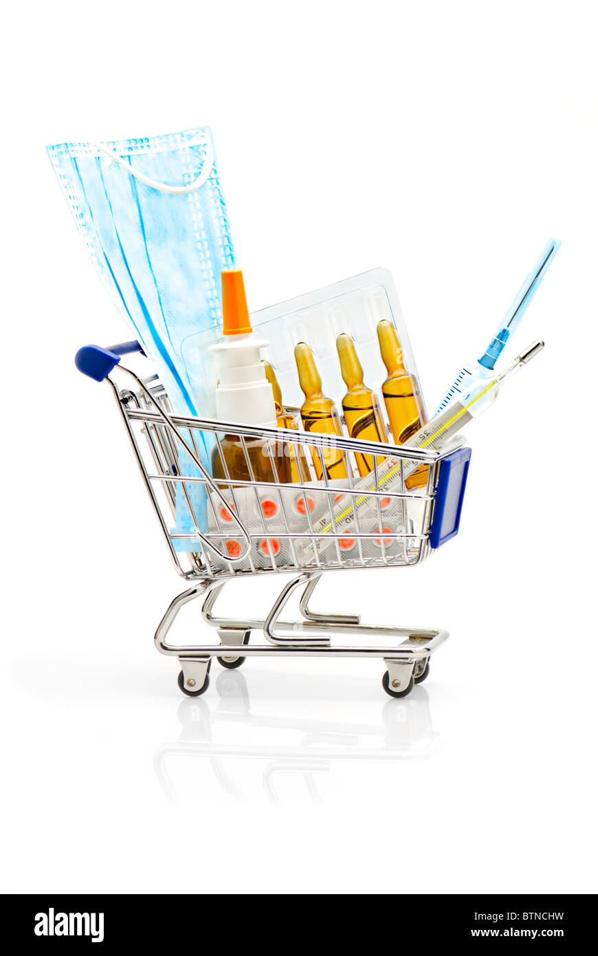 Pharmacy. Shopping Cart full with different medical supplies Stock Photo