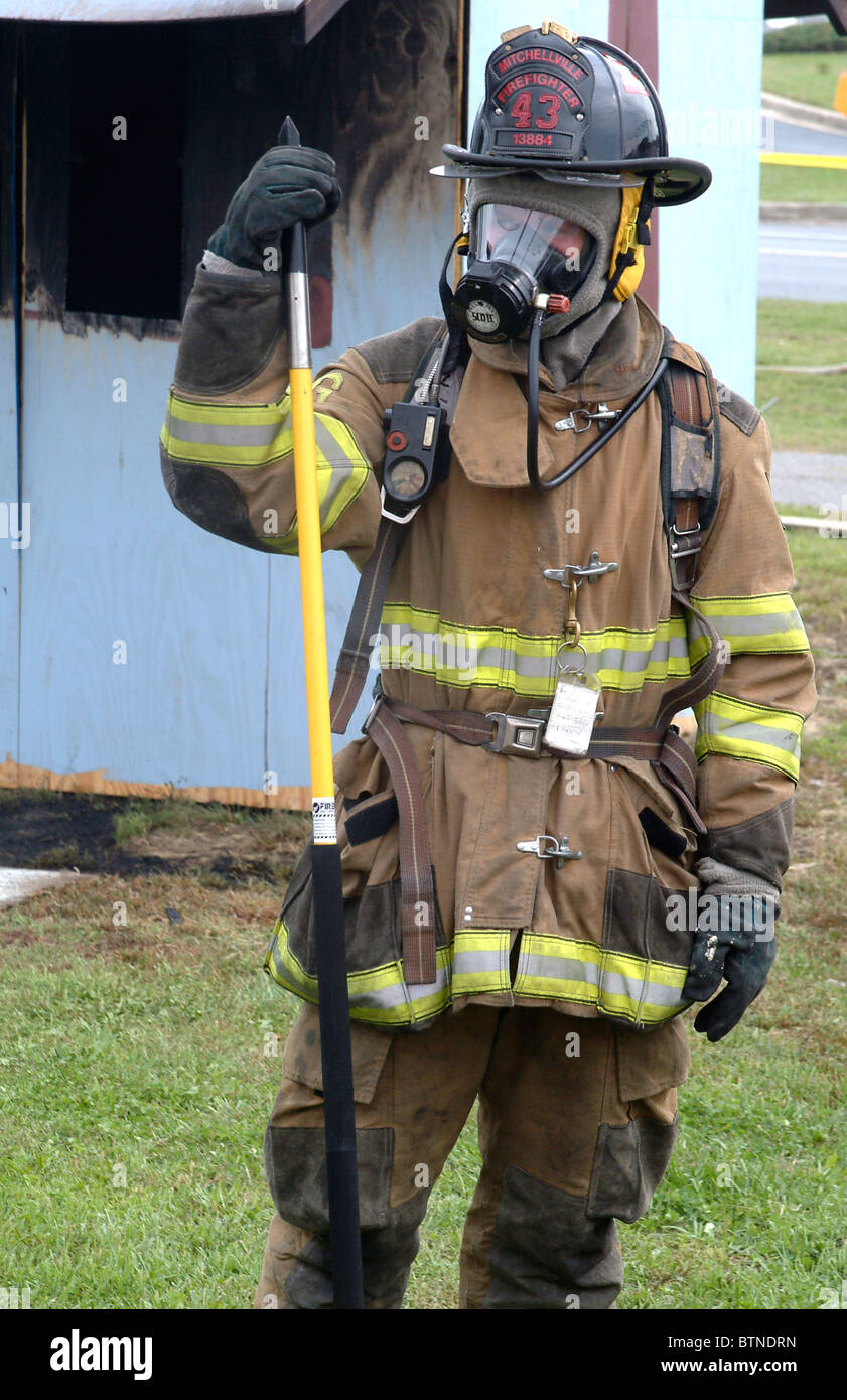 portrait of a firefighter in full turnout gear Stock Photo