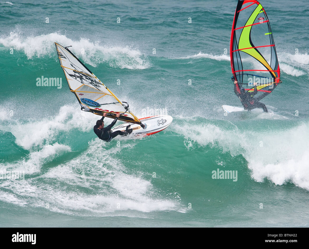 Windsurfing at Gwithian, North Cornwall, UK Stock Photo Alamy