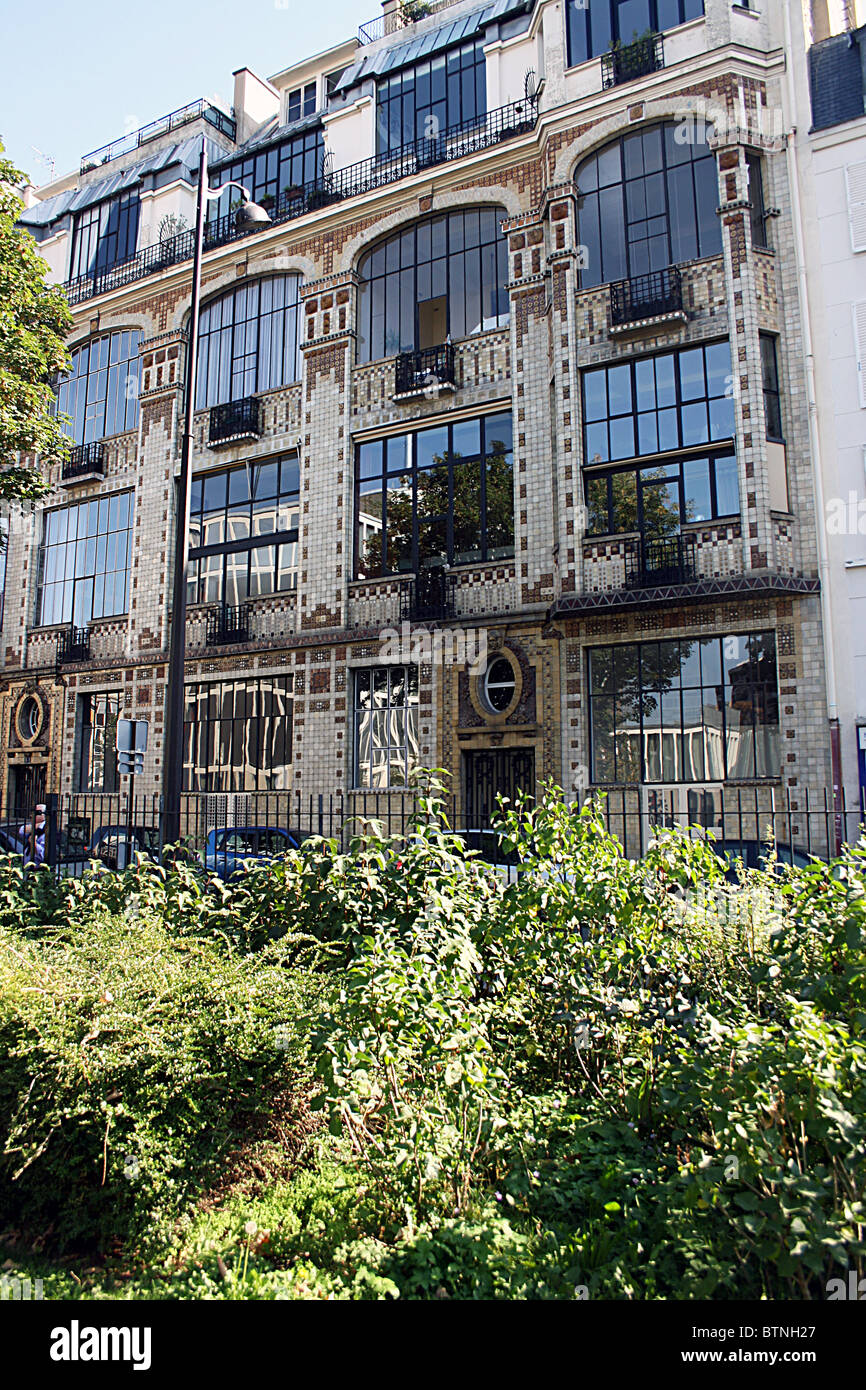 Photo inspiration: Fresh Look at Apartment Building With Artists Studios Paris Stock Photo