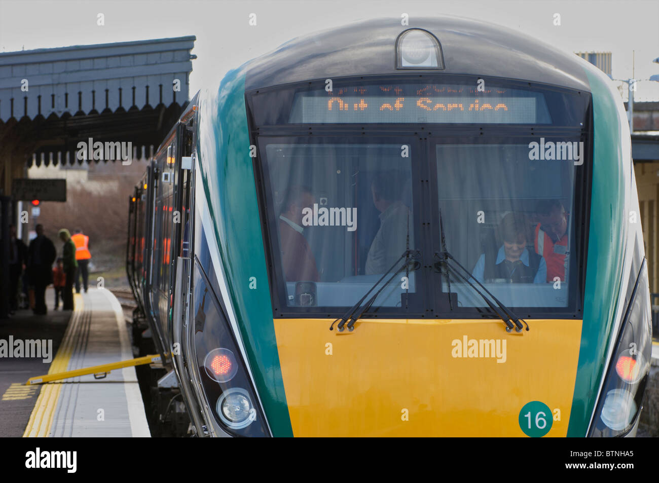 An Irish Rail train standing at the platform at Claremorris station, Co