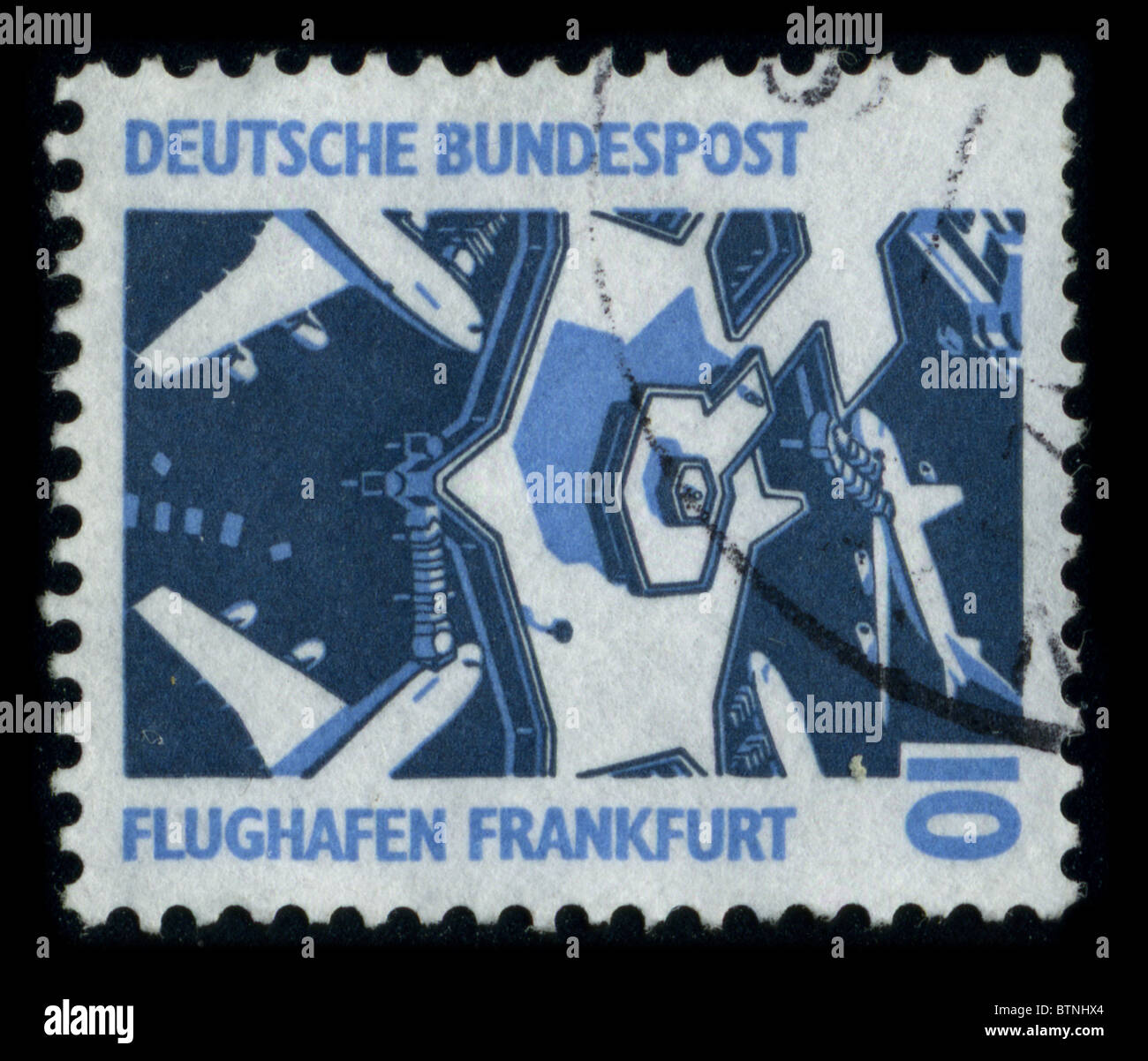 GERMANY - CIRCA 1980: A stamp printed in GERMANY shows image of the dedicated to the Frankfurt-Hahn Airport is a commercial airport located 10 km (6.2 mi) from the town of Kirchberg and 20 km (12 mi) from the town of Simmern in the Rhein-Hunsrück district of Rhineland-Palatinate to the west of central Germany, circa 1980. Stock Photo