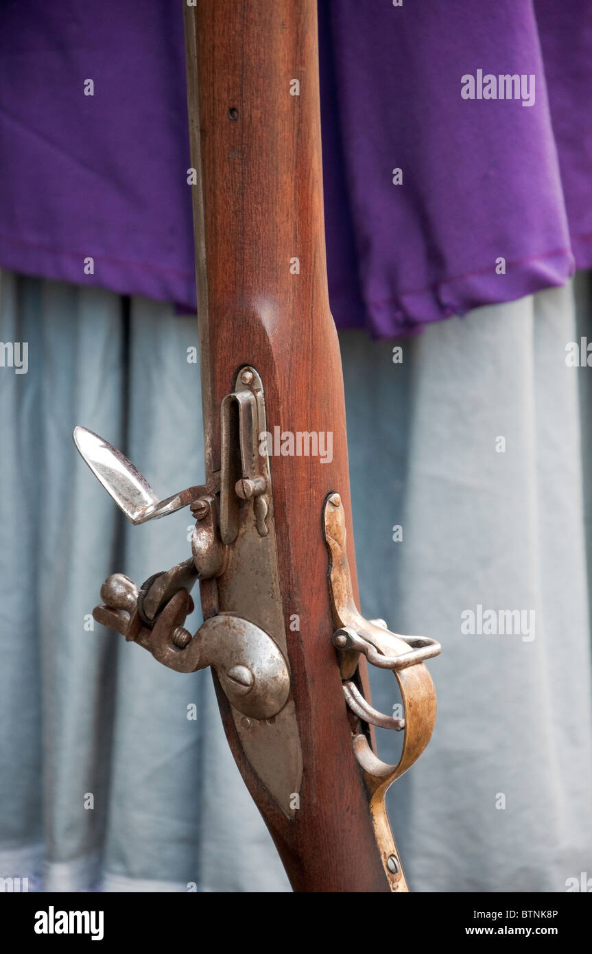 Closeup of flintlock musket being held by a woman, Seige of Derry, Londonderry, Northern Ireland Stock Photo