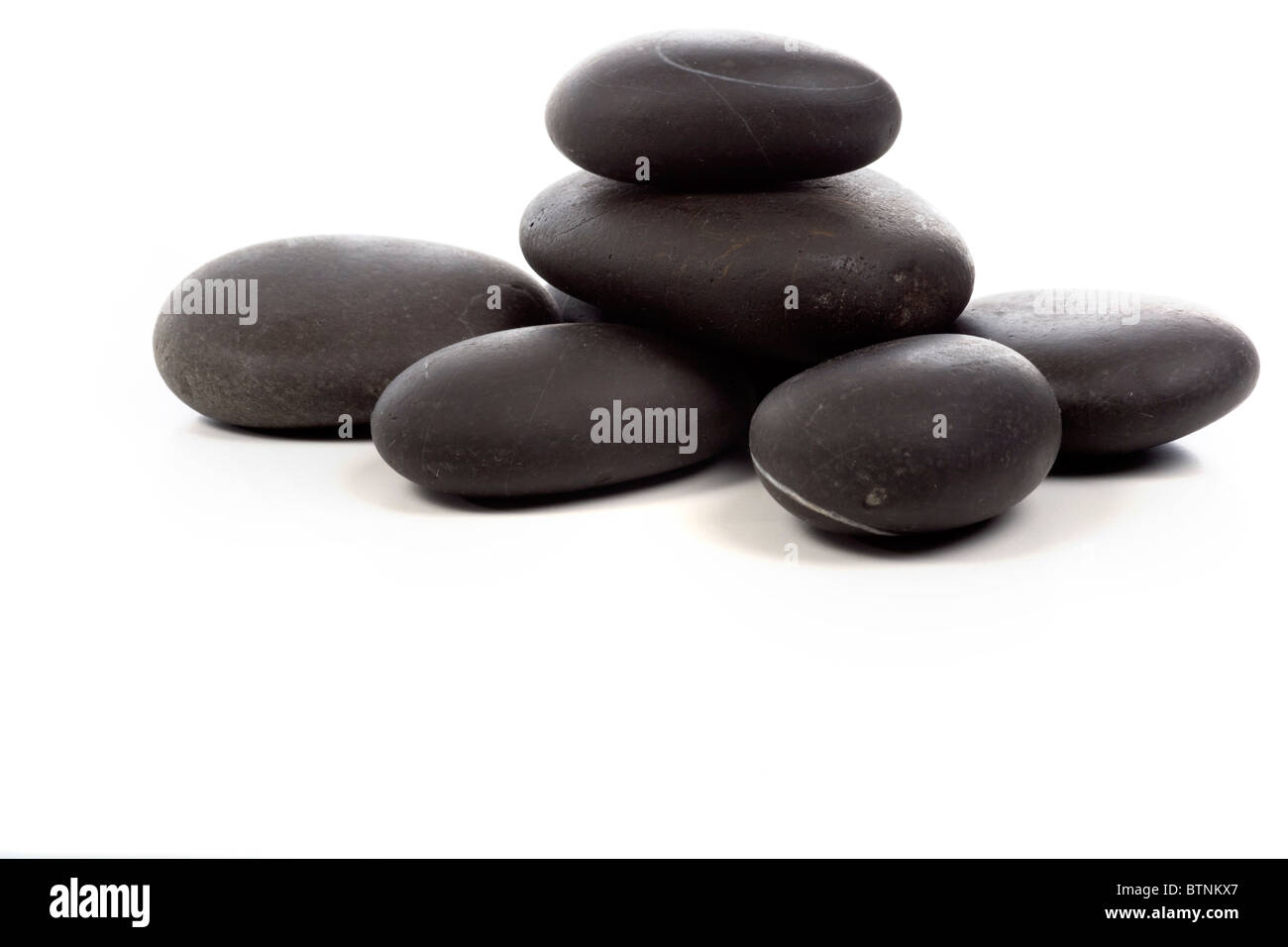 Black massage stones Stock Photo