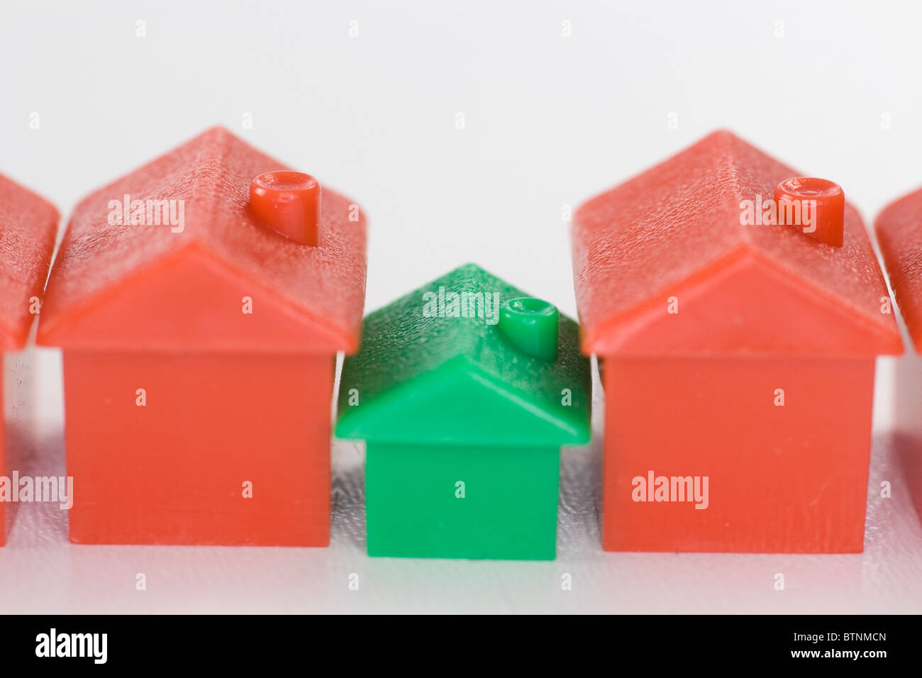 Monopoly houses in a row. Stock Photo