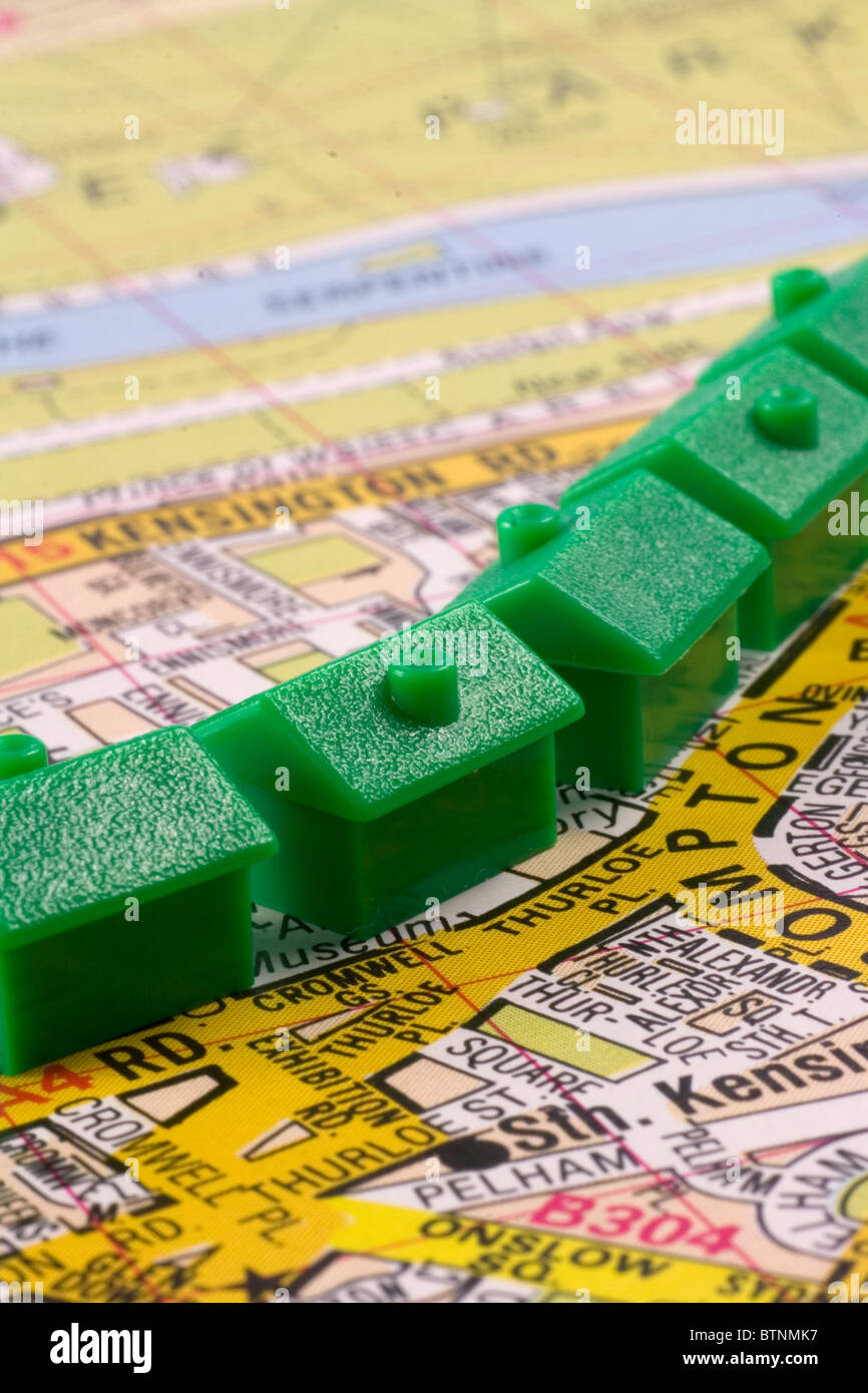 Monopoly houses in a row. Stock Photo